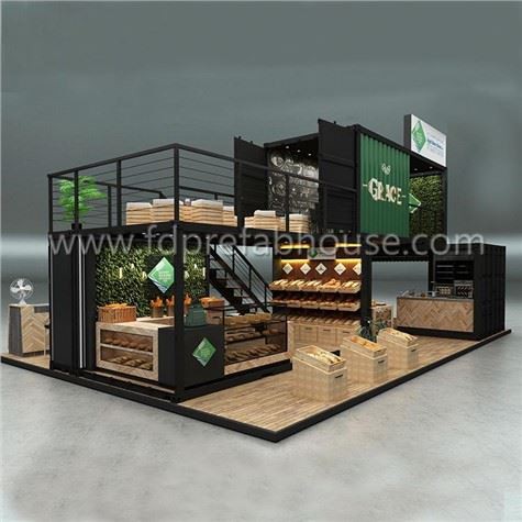 Tienda de contenedores de dos pisos con terraza